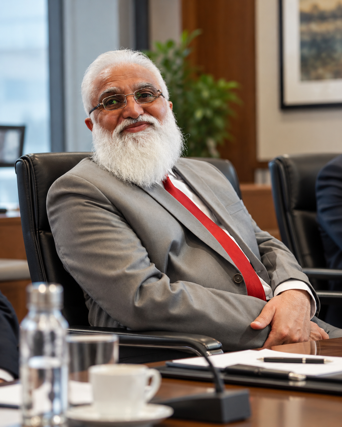 Haris Bin Maqsood in a professional boardroom setting